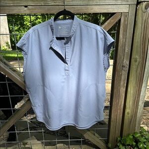 Figs vapor blue scrub top.